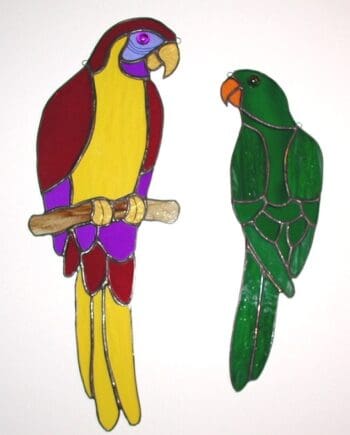 stained glass red and green parrots designs