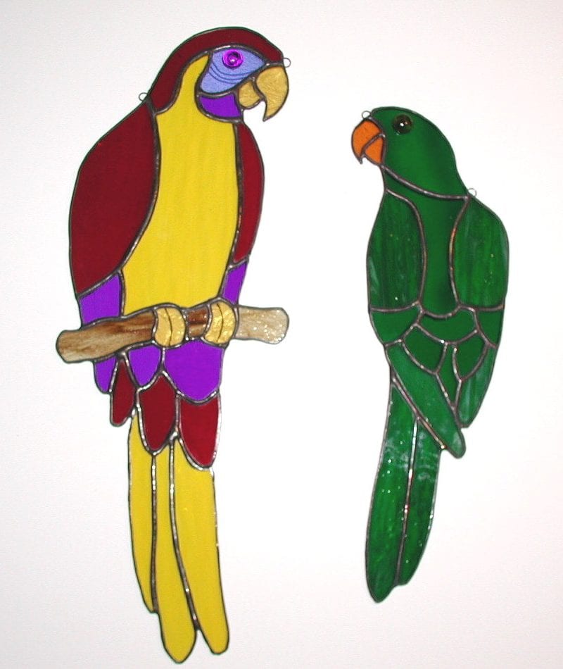 stained glass red and green parrots designs
